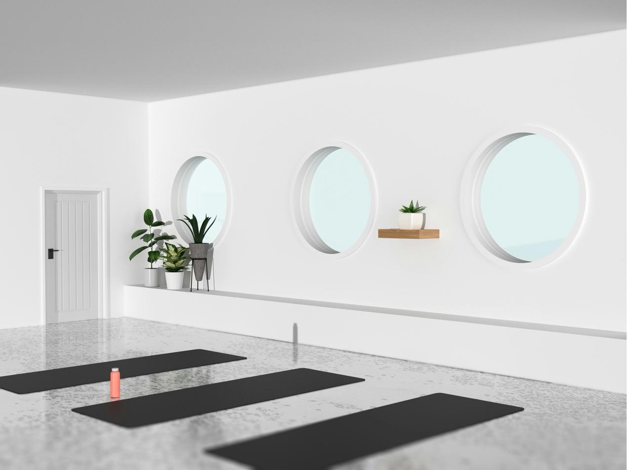 Luxury yoga studio minimal natural light warm tones